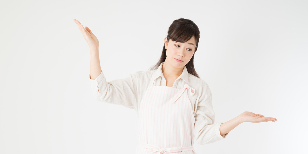 デメリットとメリットをあらわす女性